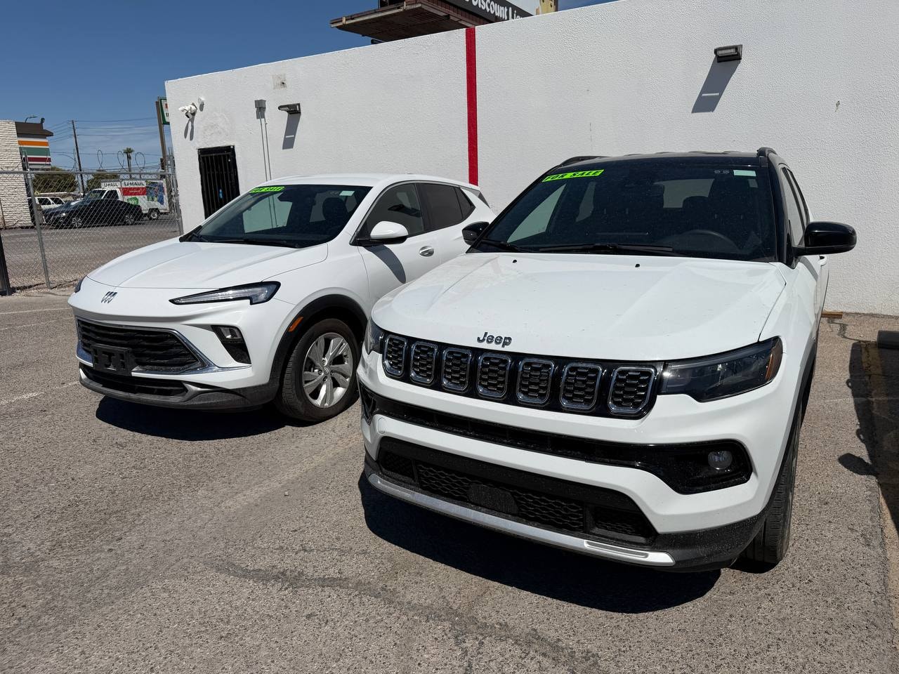 White Buick and Jeep at ICar Auto Sales